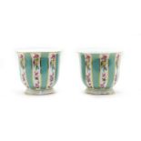A pair of Limoges hand painted cache pots,