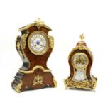 A French walnut and ormolu mounted mantle clock,