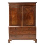 A mahogany linen press