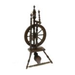 A 19th century spinning wheel