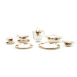 A comprehensive Royal Albert Country Rose dinner tea and coffee service,