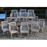 A set of twelve teak Cockpen lattice garden chairs,