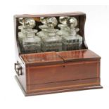 A mahogany and inlaid tantalus-cum-cigar box