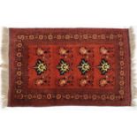 A small modern Afghan rug