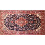 A Kashan rug,