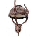 A carved wooden hanging lantern,