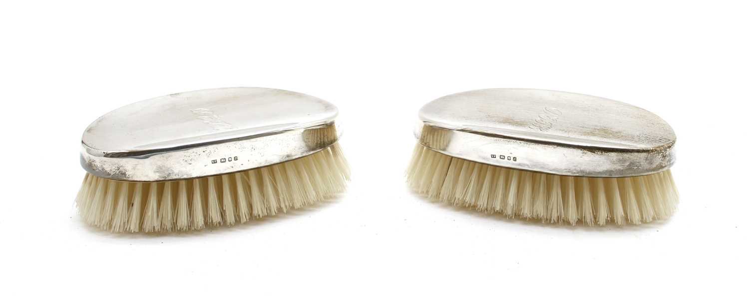 A pair of silver mounted brushes,