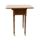 A small 19th century mahogany drop leaf table