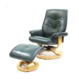 A modern Eames green leather reclining chairs