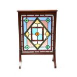 A late 19th Century mahogany framed leaded glass firescreen,