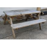 A contemporary teak picnic table,