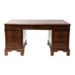 A mahogany pedestal Partners desk,