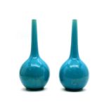 A pair of blue pottery bottle vases,