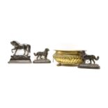 A pair of cast iron St Bernard dog fireplace ornaments, a cast iron door stop as a Horse