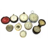 Seven pocket aneroid barometers and an altimeter,