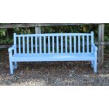 A large blue painted Brittanic teak garden bench,