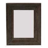 A large limed pine wall mirror,