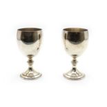 A pair of silver goblets,