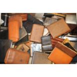 A collection of mixed cigar and cigarette cases and pouches,