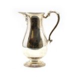 An Irish George III style silver jug,