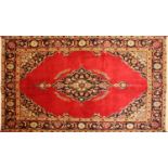 A Kashan rug,