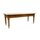 An early 20th century farmhouse pine table,