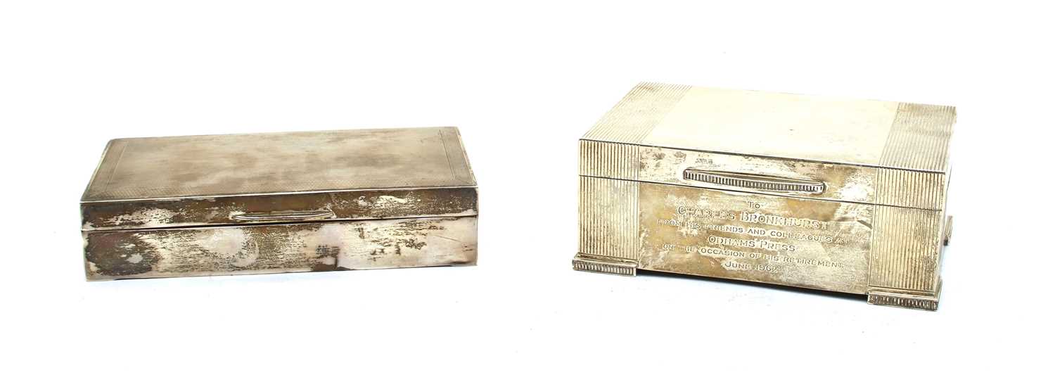 Two silver engine turned cigarette boxes,