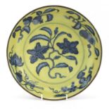 A Chinese yellow-ground blue and white dish,