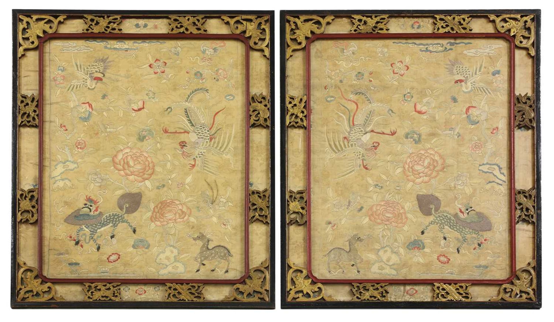 A pair of Chinese embroidered panels,