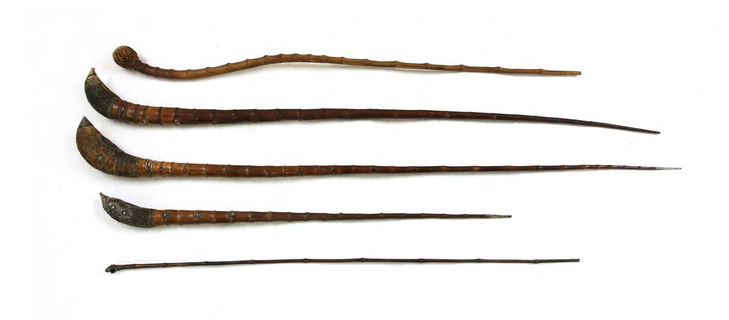 Four Chinese bamboo opium pipes,