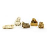 A collection of Japanese ivory netsuke,