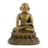 A Tibetan bronze figure,