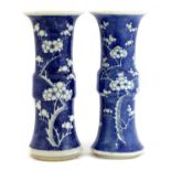 A pair of Chinese blue and white gu vases,