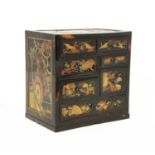 A Japanese gilt-lacquer and tortoiseshell veneered table cabinet,