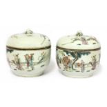 A pair of Chinese famille rose bowls and covers,