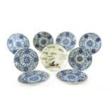 A collection of Chinese blue and white saucers,