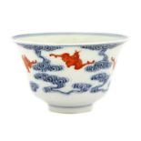 A Chinese blue and iron-red cup,