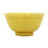 A Chinese yellow-glazed bowl,