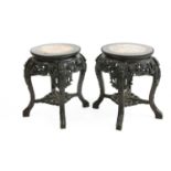 A pair of Chinese carved hardwood stands,