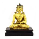 A Chinese gilt-bronze Shakyamuni Buddha,