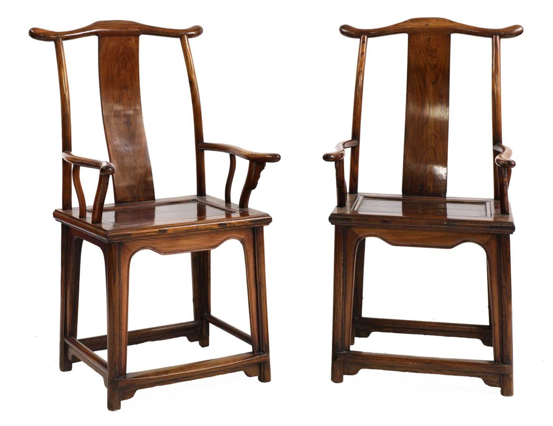 A pair of Chinese elm armchairs,