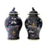 A pair of Chinese famille rose jars and covers,