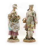 A pair of 19th century French porcelain figures,