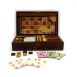A 19th century mahogany games compendium,