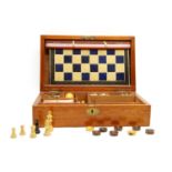 A mahogany cased games compendium,