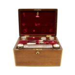 A Victorian rosewood and brass bound travelling vanity fair case,