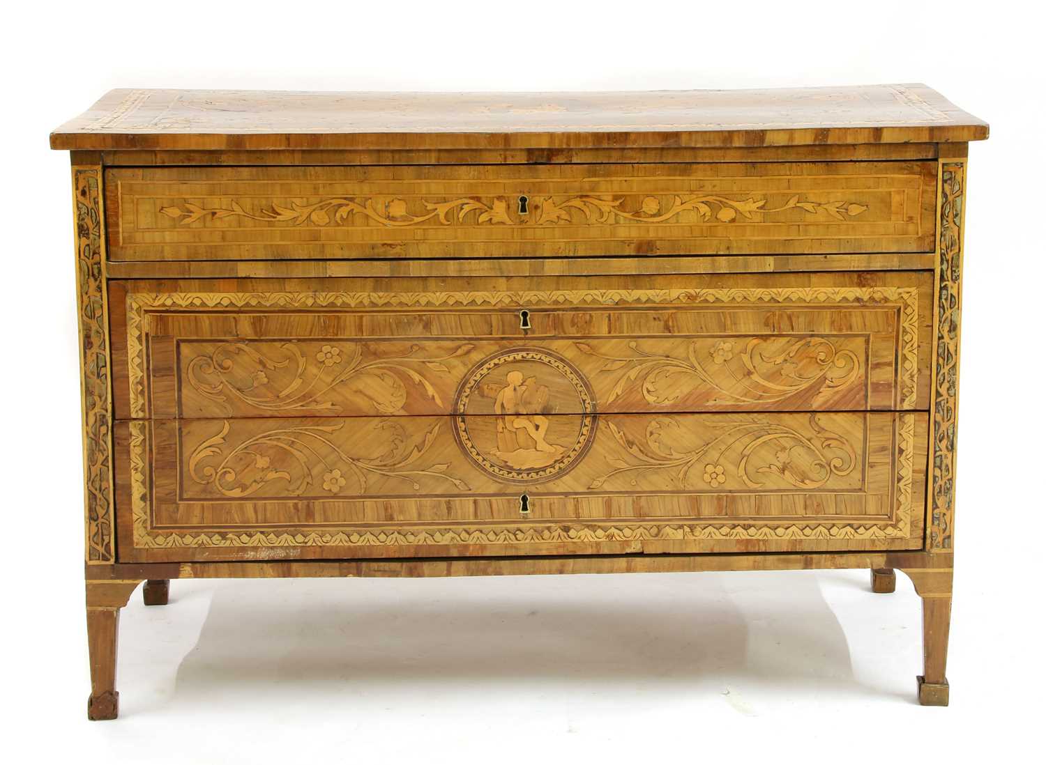 An Italian marquetry-inlaid specimen wood commode,
