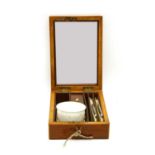 A George IV mahogany travelling shaving set,