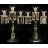 A pair of 19th century cut glass three light two branch table lustres,
