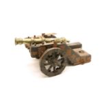 A bronze model of a cannon,